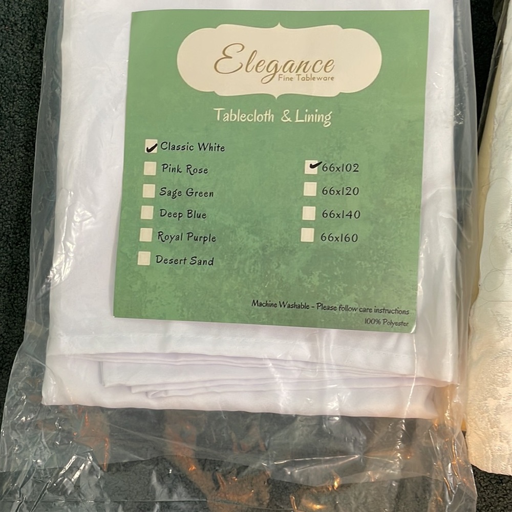 table cloth and lining white polyester on bottom and silk one that lays on top.